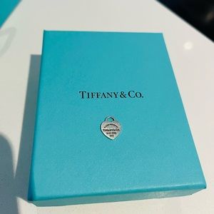 REDUCED!! Tiffany and Co small Charm/pendant.